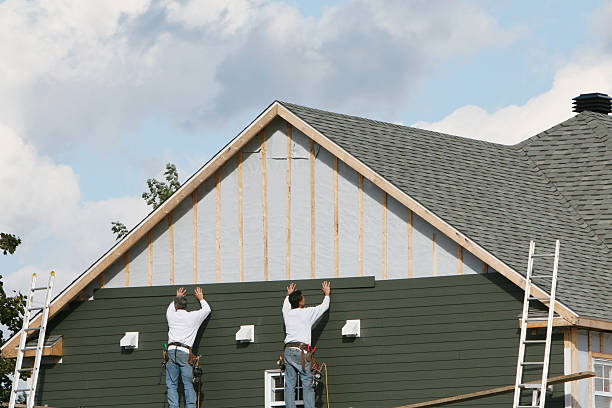Professional Siding Installation technician working in Rayland, OH